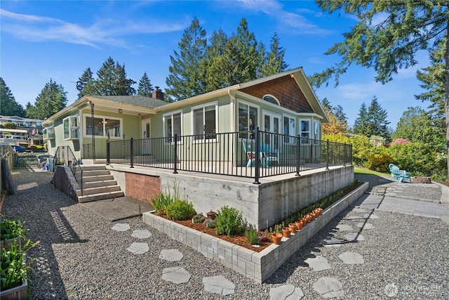 7295 Navajo Trl NE, Bremerton, WA 98311 - view of front of house featuring a patio
