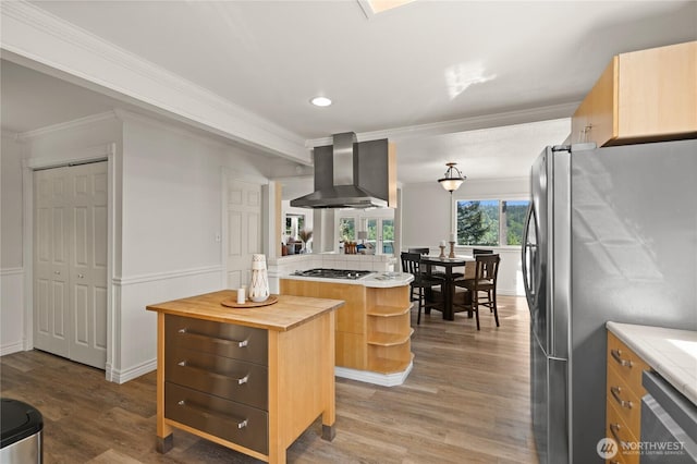 7295 Navajo Trl NE, Bremerton, WA 98311 - kitchen featuring wall chimney exhaust hood, ornamental molding, butcher block counters, open shelves, and appliances with stainless steel finishes