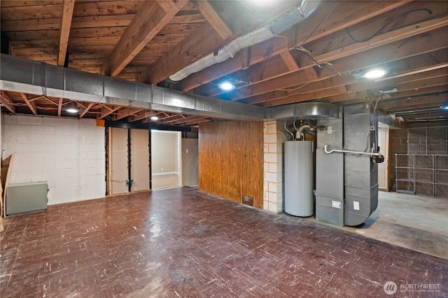 7295 Navajo Trl NE, Bremerton, WA 98311 - unfinished below grade area featuring water heater, heating unit, and tile patterned floors