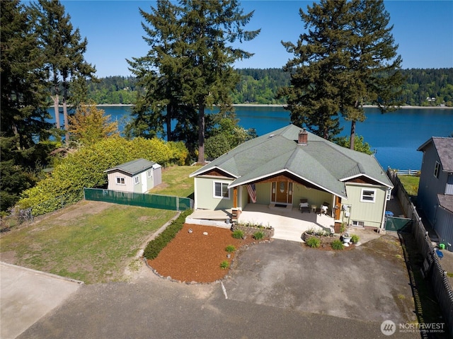 7295 Navajo Trl NE, Bremerton, WA 98311 - view from above of property featuring a heavily wooded area and a large body of water