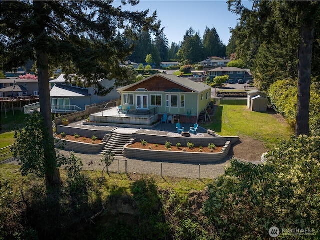 7295 Navajo Trl NE, Bremerton, WA 98311 - rear view of property with a deck and a garden