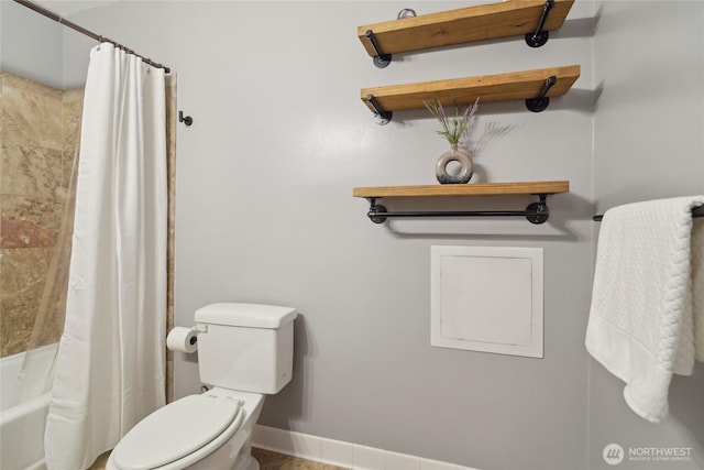 full bath with toilet, shower / bath combo, and baseboards