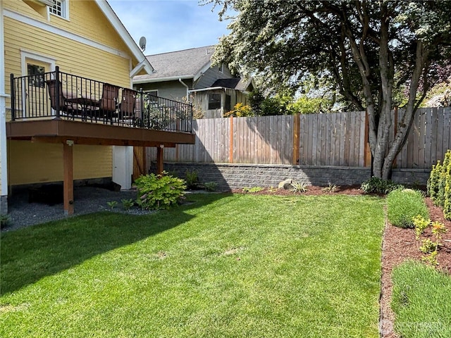 view of yard featuring a wooden deck