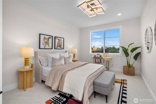 bedroom with baseboards, light carpet, and recessed lighting