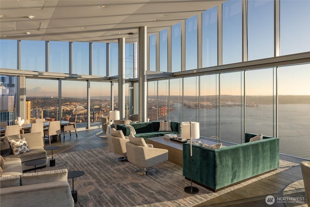 121 Stewart St Unit 2807, Seattle, WA 98101 - lobby with floor to ceiling windows, a towering ceiling, and a water view