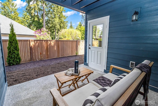 view of patio with a fenced backyard and an outdoor hangout area