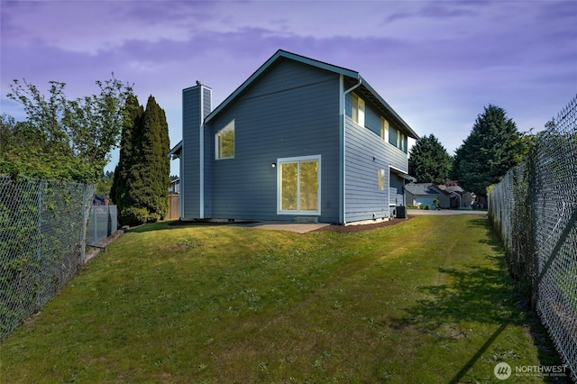 rear view of property with a chimney