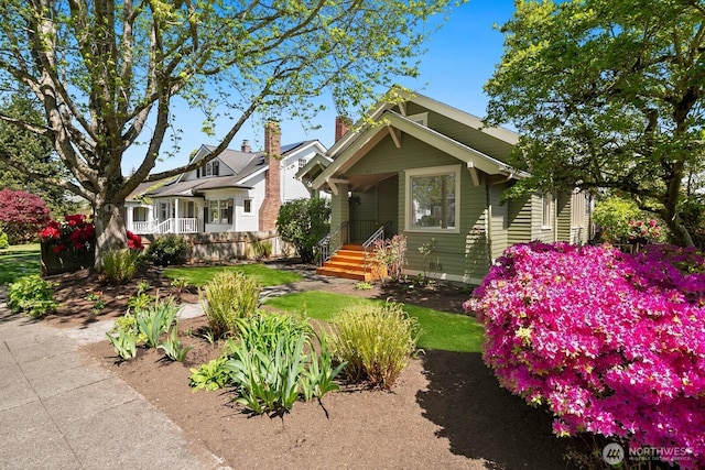 craftsman-style house with a chimney