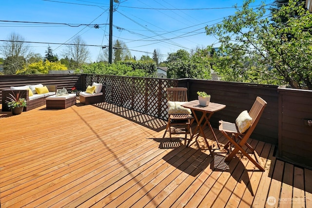 deck featuring an outdoor living space