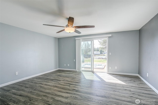 293 Glacier Ct SE, Ocean Shores, WA 98569 - unfurnished room with baseboards, ceiling fan, and dark wood-style floors