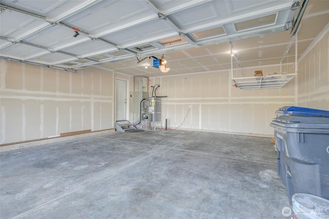 293 Glacier Ct SE, Ocean Shores, WA 98569 - garage featuring a garage door opener