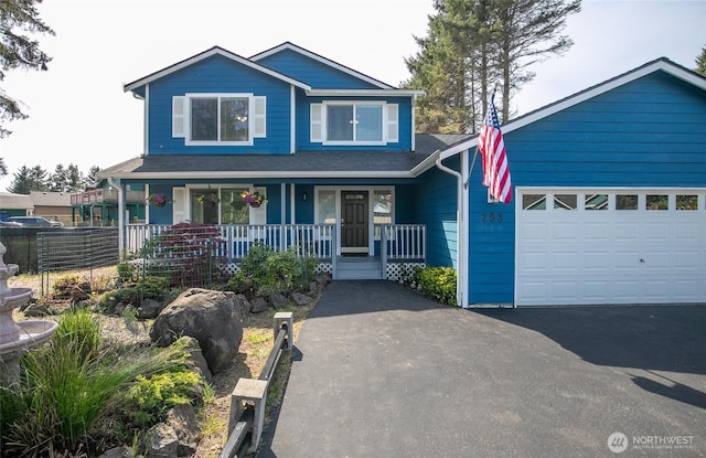 293 Glacier Ct SE, Ocean Shores, WA 98569 - craftsman inspired home with a porch and aphalt driveway