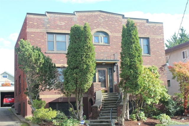 4212 Phinney Ave N, Seattle, WA 98103 - view of front facade featuring brick siding and stairs