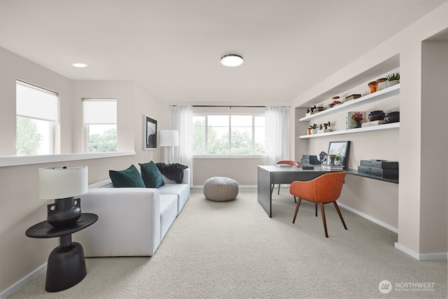 office space with carpet floors and baseboards