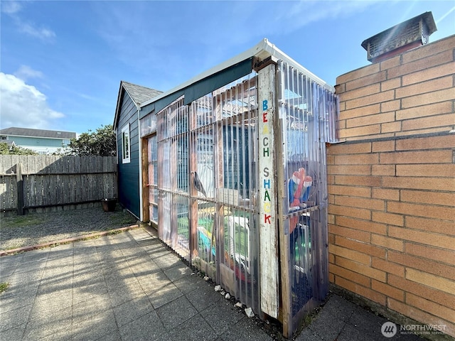 1160 Greenview Ave SW, Ocean Shores, WA 98569 - view of outdoor structure featuring a fenced backyard