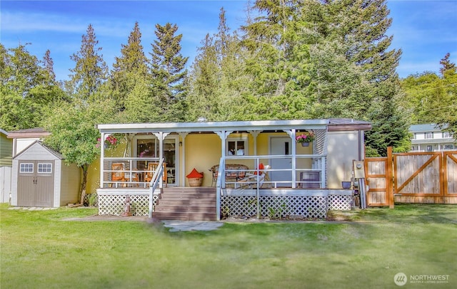 3276 E Harbor Rd, Langley, WA 98260 - view of shed with covered porch and fence