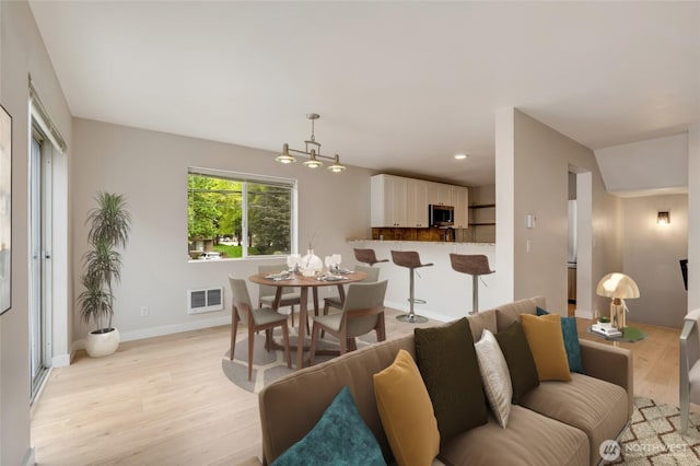 16820 6th Ave W Unit A4, Lynnwood, WA 98037 - living room with light wood-style flooring and baseboards