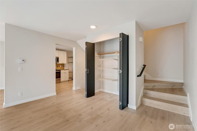16820 6th Ave W Unit A4, Lynnwood, WA 98037 - stairs with wood finished floors and baseboards