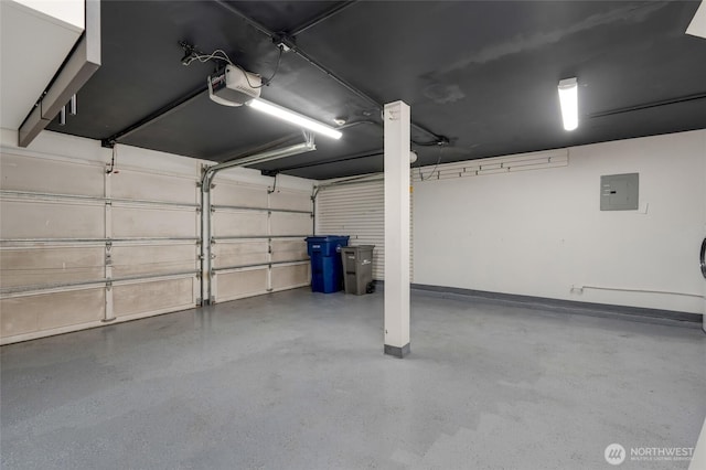 16820 6th Ave W Unit A4, Lynnwood, WA 98037 - garage with a garage door opener, electric panel, and baseboards