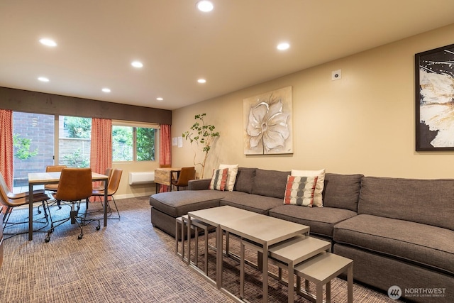 living area with recessed lighting and carpet flooring