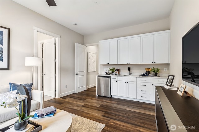 10619 132nd Ave NE Unit 101, Lake Stevens, WA 98258 - kitchen with dishwasher, white cabinets, dark wood-style floors, and light countertops