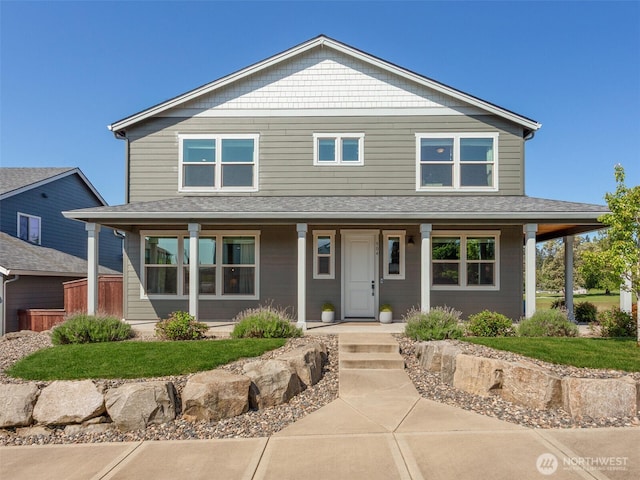 904 E Tanoak Ave, La Center, WA 98629 - view of front of property featuring covered porch and a shingled roof