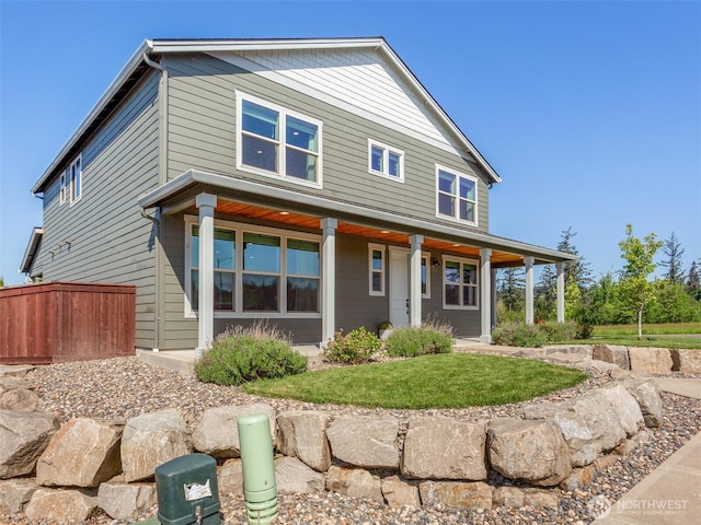 904 E Tanoak Ave, La Center, WA 98629 - view of front of home featuring covered porch and fence