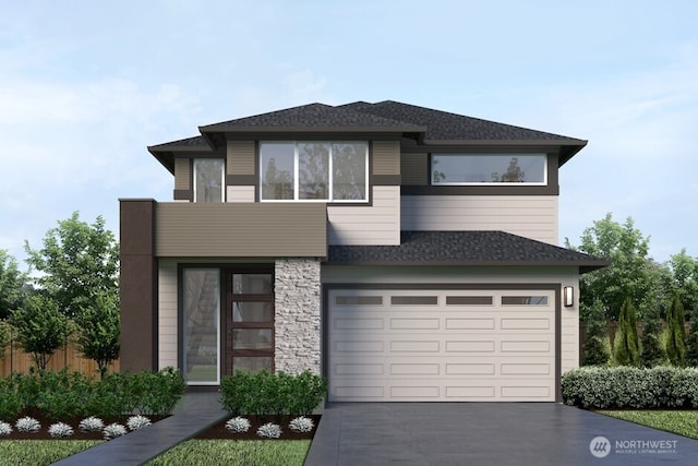prairie-style home with an attached garage, roof with shingles, fence, and concrete driveway