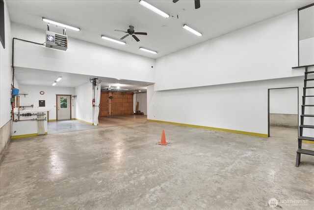 1321 E Smith Rd, Bellingham, WA 98226 - garage with baseboards and a ceiling fan