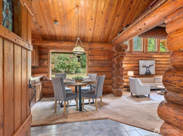 1321 E Smith Rd, Bellingham, WA 98226 - tiled dining room with rustic walls and wood ceiling