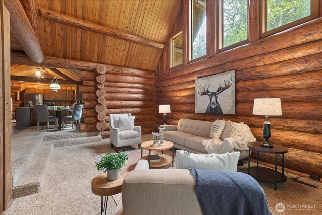 1321 E Smith Rd, Bellingham, WA 98226 - carpeted living room with beam ceiling, wood ceiling, and log walls