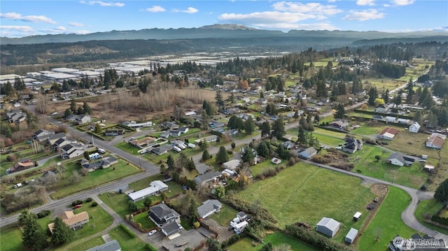 bird's eye view featuring a residential view and a mountain view