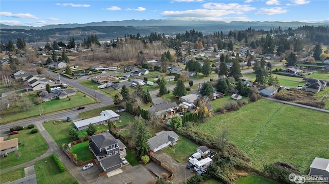 bird's eye view with a mountain view and a residential view