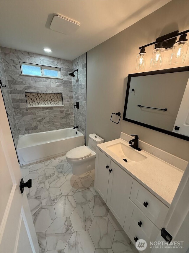 bathroom with shower / tub combination, marble finish floor, toilet, and vanity