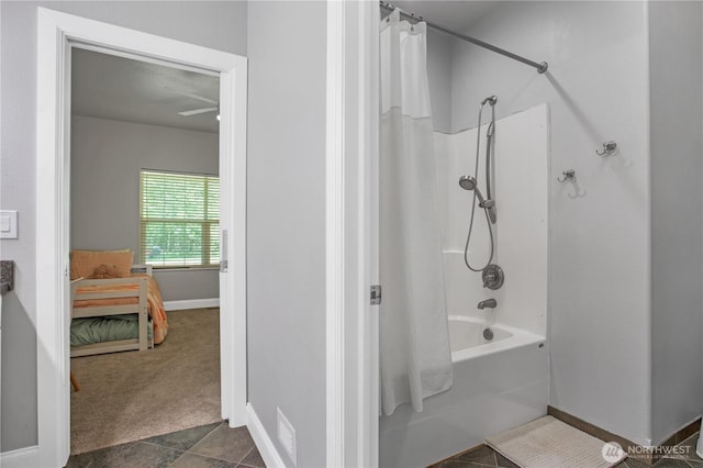 full bathroom featuring shower / bath combo with shower curtain and baseboards
