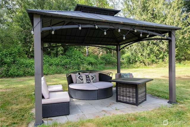 view of patio with a gazebo and outdoor lounge area