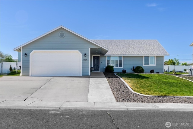 804 W Windrose Dr, Moses Lake, WA 98837 - ranch-style home with an attached garage, concrete driveway, and a shingled roof