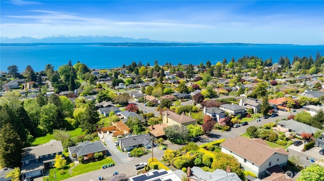bird's eye view featuring a water and mountain view and a residential view