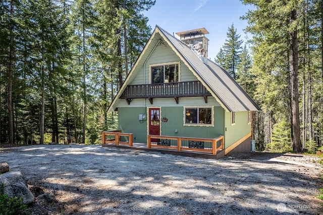 2684 Cedar Crst, Leavenworth, WA 98826 - view of side of home with a wooden deck and metal roof