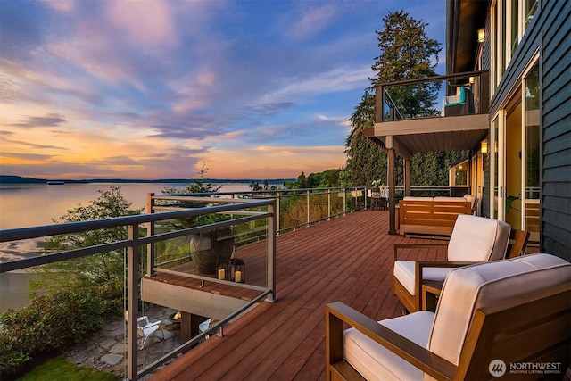 deck at dusk with a water view