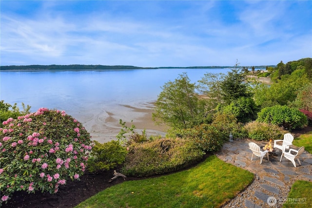 water view with an outdoor fire pit