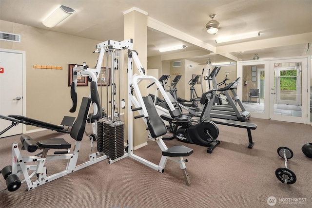 workout area featuring french doors, baseboards, and carpet flooring