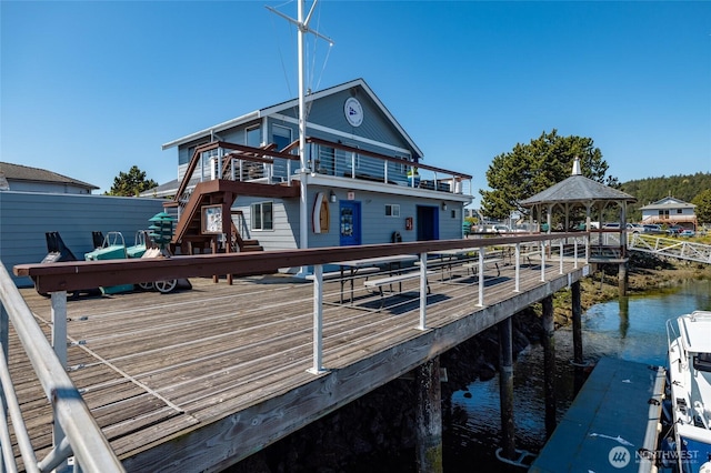 dock with a water view and a gazebo