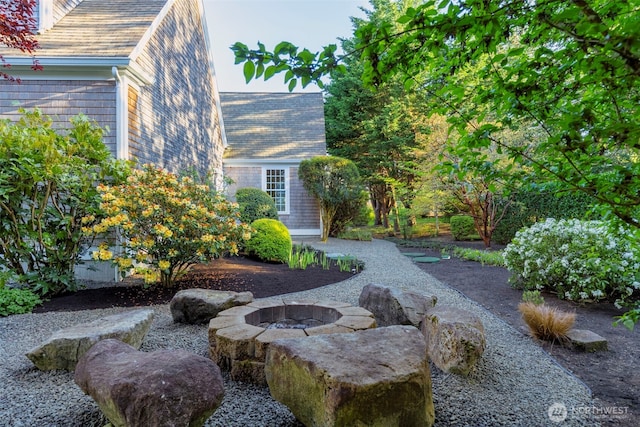 11281 Fieldstone Ln NE, Bainbridge Island, WA 98110 - view of yard with an outdoor fire pit