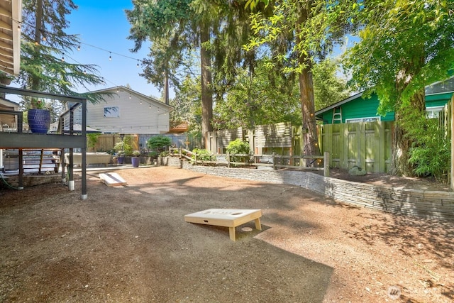 view of property's community featuring a fenced backyard