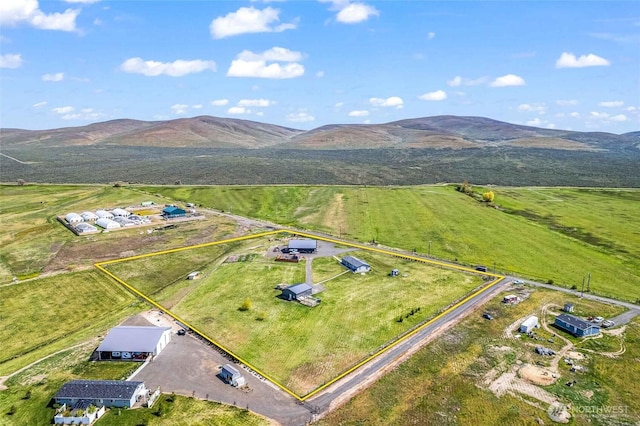 bird's eye view featuring a mountain view and a rural view