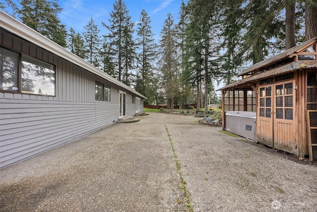 view of side of property featuring board and batten siding
