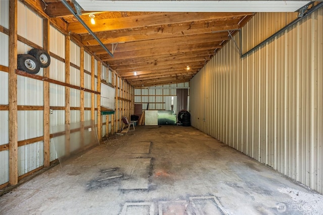 misc room featuring a garage