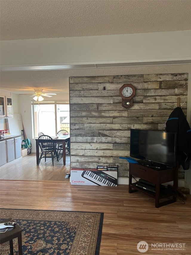 240 Parkwood Blvd, Sequim, WA 98382 - living room with wood finished floors, ceiling fan, and a textured ceiling