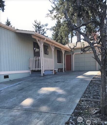 240 Parkwood Blvd, Sequim, WA 98382 - view of front of house with a garage, driveway, and crawl space